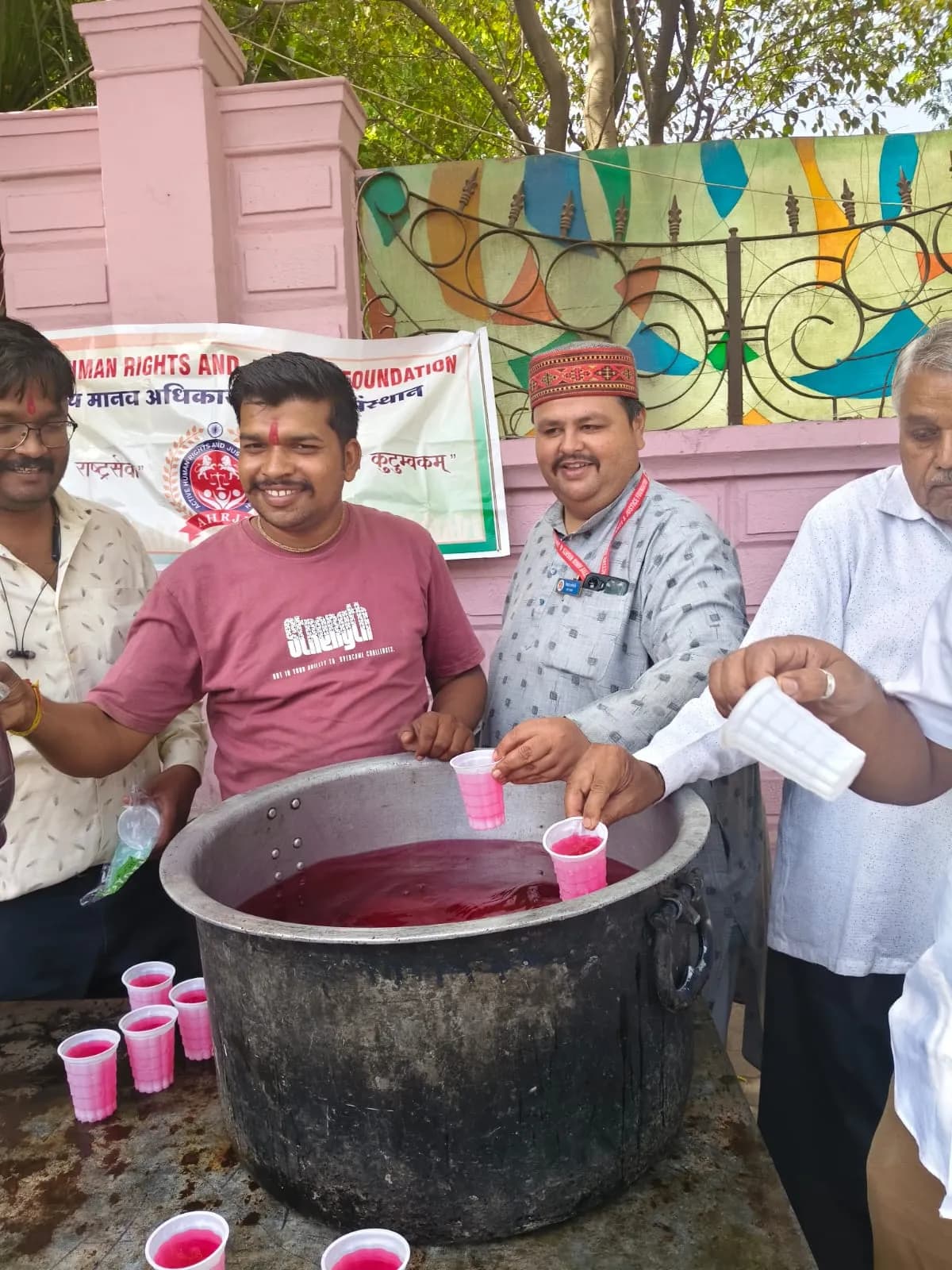 Distribution of Cooling Drinks by the ACTIVE HUMAN RIGHTS AND JUSTICE FOUNDATION for relief from the heat.